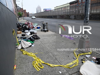 The aftermath scene of a pedestrian struck incident is being photographed in Brooklyn, New York, United States, on May 25, 2024. At approxim...