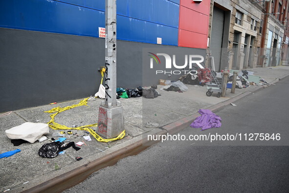 The aftermath scene of a pedestrian struck incident is being photographed in Brooklyn, New York, United States, on May 25, 2024. At approxim...