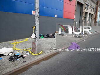 The aftermath scene of a pedestrian struck incident is being photographed in Brooklyn, New York, United States, on May 25, 2024. At approxim...