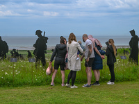 VER-SUR-MER, FRANCE - MAY 26: 
Visitors discover 1,475 upcycled giant soldier silhouettes by 'Standing with Giants,' symbolizing the British...