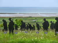 VER-SUR-MER, FRANCE - MAY 26: 
An art installation featuring 1,475 upcycled giant soldier silhouettes by 'Standing with Giants,' symbolizing...