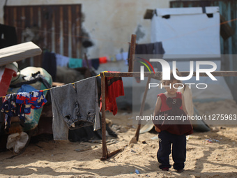 Palestinians are gathering on the beach in Deir el-Balah, central Gaza Strip, on May 26, 2024, amid the ongoing conflict between Israel and...