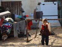 Palestinians are gathering on the beach in Deir el-Balah, central Gaza Strip, on May 26, 2024, amid the ongoing conflict between Israel and...