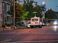 Police are present and evidence markers are highlighting shell casings at the crime scene. One person is killed and two people are injured i...