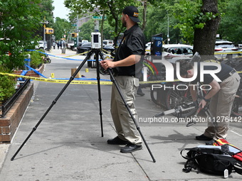 Crime scene investigators are at the scene. A 29-year-old male is being fatally stabbed in Manhattan, New York, United States, on May 26, 20...