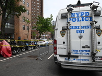 The NYPD crime scene unit is at the scene. A 29-year-old male is being fatally stabbed in Manhattan, New York, United States, on May 26, 202...