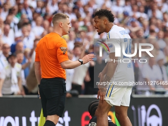 Georginio Rutter (Leeds United) is arguing with the assistant referee during the SkyBet Championship Playoff Final between Leeds United and...