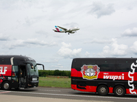 The Eurowings aircraft is landing at Cologne & Bonn Airport in Cologne, Germany, on May 26, 2024, as the Bayer 04 Leverkusen team is winning...