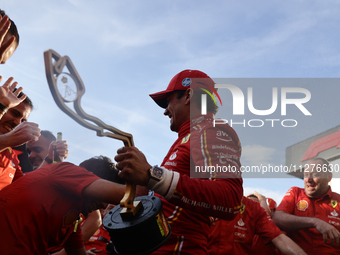 Charles Leclerc of Ferrari celebrates with the team after Grand Prix of Monaco at Circuit de Monaco in Monaco on May 26, 2023. (