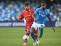 Santiago Pierotti of US Lecce competes for the ball with Jens Cajuste of SSC Napoli during the Serie A TIM match between SSC Napoli and US L...