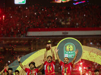 Al-Ahly club players are celebrating the cup on the podium at Cairo International Stadium in Cairo, Egypt, on May 25, 2024. (