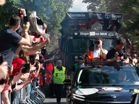 A team of Bayer 04 Leverkusen is arriving with an open bus to celebrate with the fans on the way to Bay Arena Stadium in Leverkusen, Germany...
