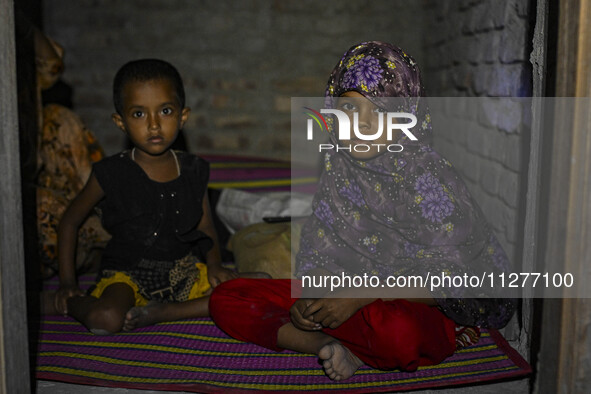 Bangladeshi children are taking shelter in the Cyclone Shelter in Kuakata, Bangladesh, on May 26, 2024, ahead of Cyclone Remal's landfall in...