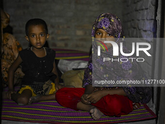 Bangladeshi children are taking shelter in the Cyclone Shelter in Kuakata, Bangladesh, on May 26, 2024, ahead of Cyclone Remal's landfall in...