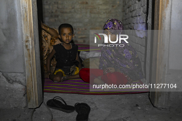 Bangladeshi children are taking shelter in the Cyclone Shelter in Kuakata, Bangladesh, on May 26, 2024, ahead of Cyclone Remal's landfall in...