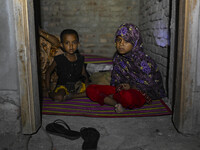 Bangladeshi children are taking shelter in the Cyclone Shelter in Kuakata, Bangladesh, on May 26, 2024, ahead of Cyclone Remal's landfall in...