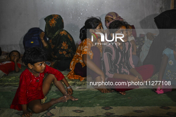 Bangladeshi children are taking shelter in the Cyclone Shelter in Kuakata, Bangladesh, on May 26, 2024, ahead of Cyclone Remal's landfall in...