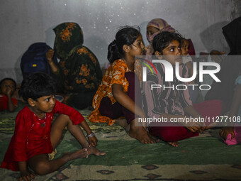 Bangladeshi children are taking shelter in the Cyclone Shelter in Kuakata, Bangladesh, on May 26, 2024, ahead of Cyclone Remal's landfall in...