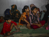 Bangladeshi children are taking shelter in the Cyclone Shelter in Kuakata, Bangladesh, on May 26, 2024, ahead of Cyclone Remal's landfall in...