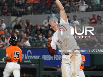 Oklahoma first baseman Michael Snyder #5 is catching the ball during the 2024 Big 12 Baseball Championship game between the Oklahoma State U...