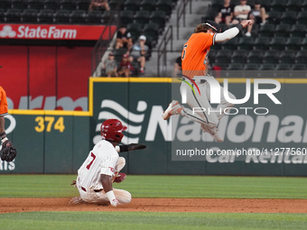 Oklahoma State shortstop Lane Forsythe #6 is jumping after making the out at second base against Kendall Pettis #7 of Oklahoma during the 20...