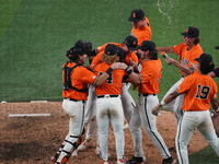 Oklahoma State players are celebrating their victory over Oklahoma during the 2024 Big 12 Baseball Championship game between the Oklahoma St...
