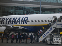 DUBLIN, IRELAND - MAY 22: 
Passengers board a Ryanair plane at Dublin Airport, on May 22, 2024, in Dublin, Ireland. (