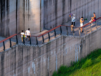 Citizens are playing on the beach of the Jialing River as the water level drops in Chongqing, China, on May 26, 2024. (