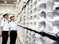 Customs officers are inspecting products about to be exported in a workshop of an automobile wheel manufacturer in Binzhou, China, on May 27...