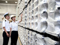 Customs officers are inspecting products about to be exported in a workshop of an automobile wheel manufacturer in Binzhou, China, on May 27...