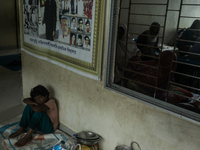 People are taking shelter in a school as Cyclone Remal is landing in Satkhira, Bangladesh, on May 27, 2024 (