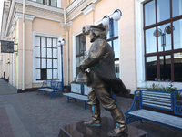 The monument to Father Fyodor, a character from The Twelve Chairs novel by Soviet authors Ilf and Petrov, is being pictured on the platform...