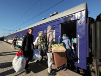 Families with children are evacuating from the frontline areas of Kharkiv region on the train as they go on vacation to western Ukraine with...