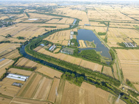 A harvest of wheat is being seen on a vast field in Lianyungang, China, on May 27, 2024. (