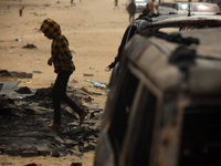 Palestinians are gathering at the site of an Israeli strike on a camp for internally displaced people in Rafah, on May 27, 2024, amid ongoin...