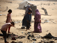 Palestinians are gathering at the site of an Israeli strike on a camp for internally displaced people in Rafah, on May 27, 2024, amid ongoin...