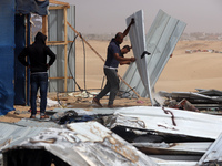 Palestinians are gathering at the site of an Israeli strike on a camp for internally displaced people in Rafah, on May 27, 2024, amid ongoin...