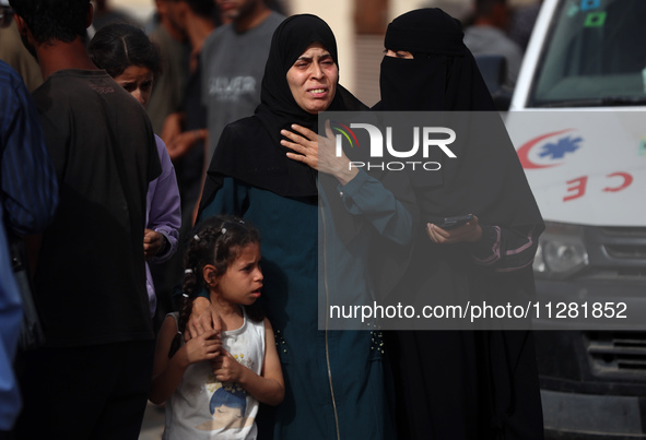 Palestinians are gathering at the site of an Israeli strike on a camp for internally displaced people in Rafah, on May 27, 2024, amid ongoin...