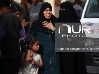 Palestinians are gathering at the site of an Israeli strike on a camp for internally displaced people in Rafah, on May 27, 2024, amid ongoin...