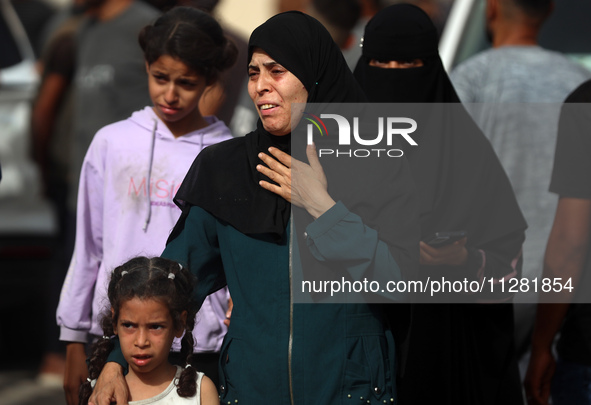 Palestinians are gathering at the site of an Israeli strike on a camp for internally displaced people in Rafah, on May 27, 2024, amid ongoin...