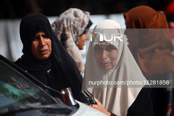 Palestinians are gathering at the site of an Israeli strike on a camp for internally displaced people in Rafah, on May 27, 2024, amid ongoin...