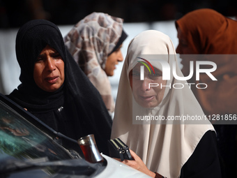 Palestinians are gathering at the site of an Israeli strike on a camp for internally displaced people in Rafah, on May 27, 2024, amid ongoin...