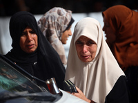 Palestinians are gathering at the site of an Israeli strike on a camp for internally displaced people in Rafah, on May 27, 2024, amid ongoin...