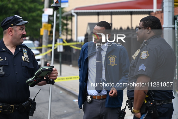 Investigators are at the scene in Brooklyn, New York, on May 26, 2024. One person is dead after a vehicle collision following a police pursu...