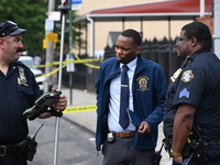 Investigators are at the scene in Brooklyn, New York, on May 26, 2024. One person is dead after a vehicle collision following a police pursu...