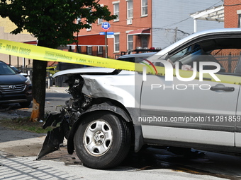 A Honda Pilot is being damaged. One person is dead after a vehicle collision following a police pursuit in Brooklyn, New York, on May 26, 20...