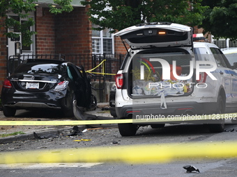 A Mercedes Benz is damaged, and one person is dead after a vehicle collision following a police pursuit in Brooklyn, New York, on May 26, 20...