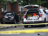 A Mercedes Benz is damaged, and one person is dead after a vehicle collision following a police pursuit in Brooklyn, New York, on May 26, 20...