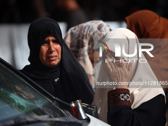 Palestinians are gathering at the site of an Israeli strike on a camp for internally displaced people in Rafah, on May 27, 2024, amid ongoin...