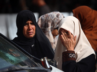 Palestinians are gathering at the site of an Israeli strike on a camp for internally displaced people in Rafah, on May 27, 2024, amid ongoin...